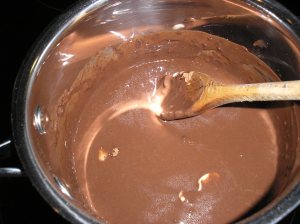 Frosting - melting butter and cocoa