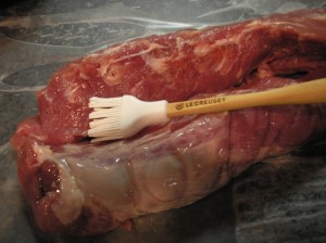 Brush the roast with oil