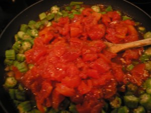 Add tomatoes and seasonings.  Stir well.