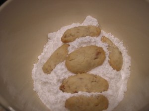 Roll in powdered sugar -  TWICE