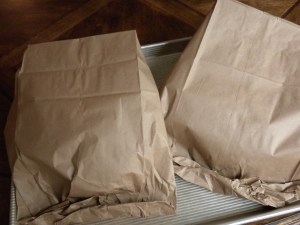 Put in a paper bag on a baking sheet.