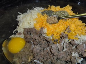 Sausage, egg, swiss cheese, cheddar cheese 