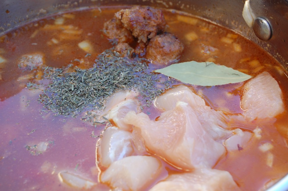 chicken, sausage, thyme, and bay leaf